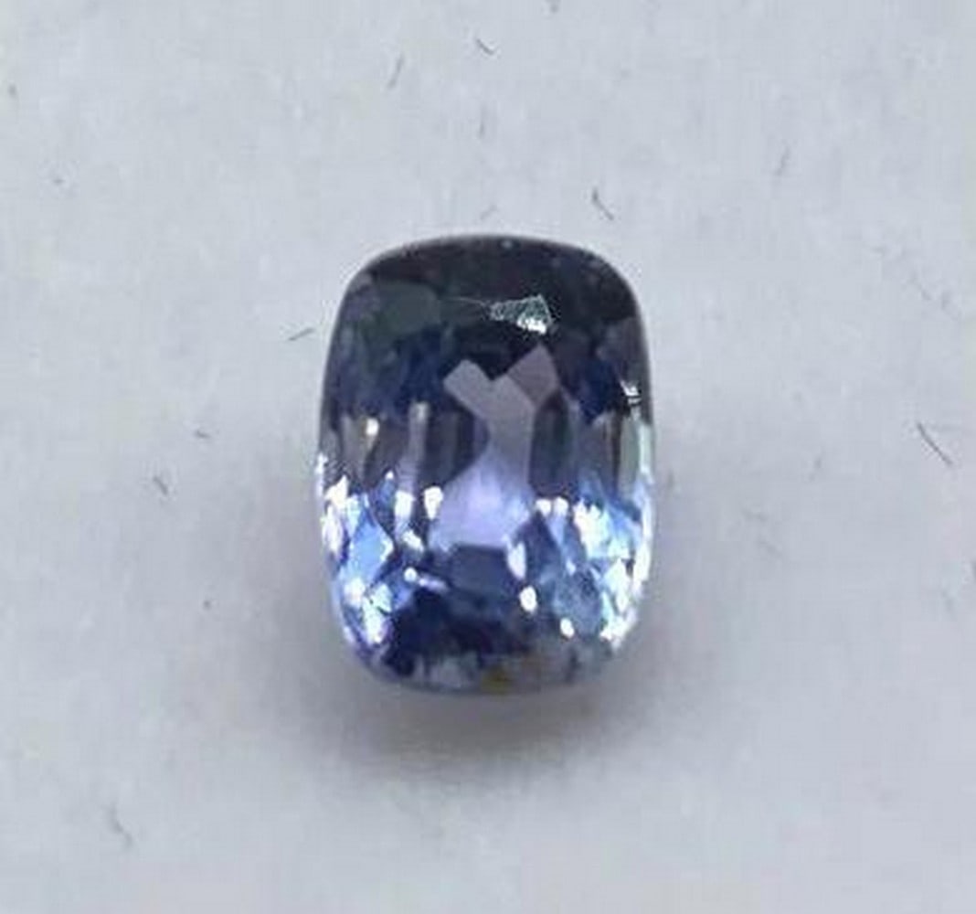 1.33ct Cushion Cut Blue Ceylon Sapphire: 1.33ct Cushion Cut Blue Ceylon Sapphire Size: 6.5 x 4.9mm Total Carat Weight: 1.33ct Untreated A flawless stone with amazing clarity and a light blue hue giving the stone a attractive, but not overpow