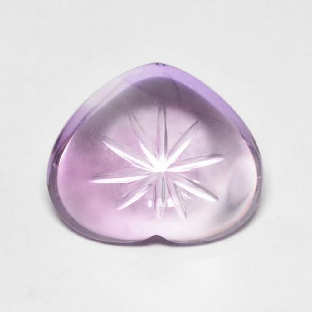 6.53ct Violet Carved Heart Amethyst Stone: 6.53ct Violet Carved Heart Amethyst Stone Amethyst is a natural tranquilizer, it relieves stress and strain, soothes irritability, balances mood swings, dispels anger, rage, fear and anxiety. Alleviat