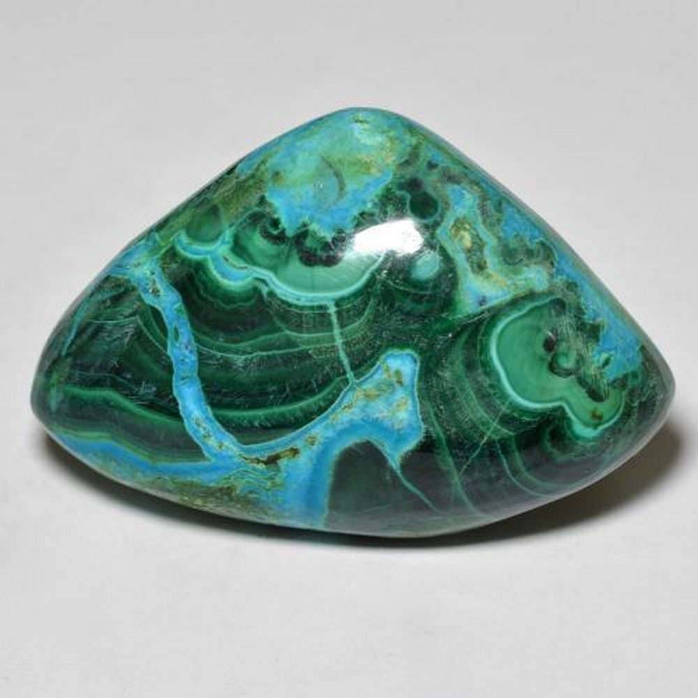 Fancy Cabochon Multicolor Chrysocolla: Fancy Cabochon Multicolor Chrysocolla Chrysocolla, brings tranquility, peace, intuition, patience and unconditional love, is known as a healing stone among Native American cultures. It has been used