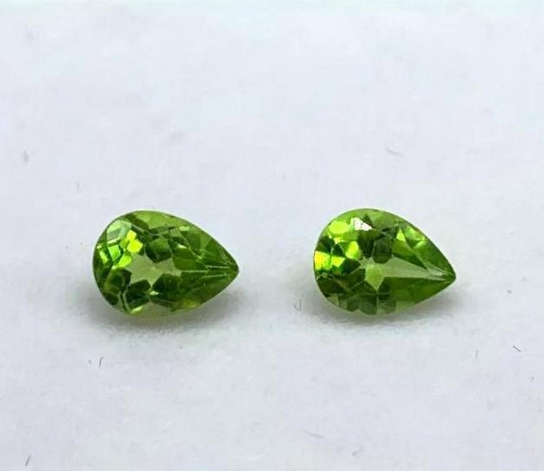 6.2 X 5.3mm Matching Pear Green Peridots: 6.2 X 5.3mm Matching Pear Green Peridots Known as the stone of compassion, peridot is believed to bring good health, restful sleep and peace to relationships by balancing emotions and mind. This