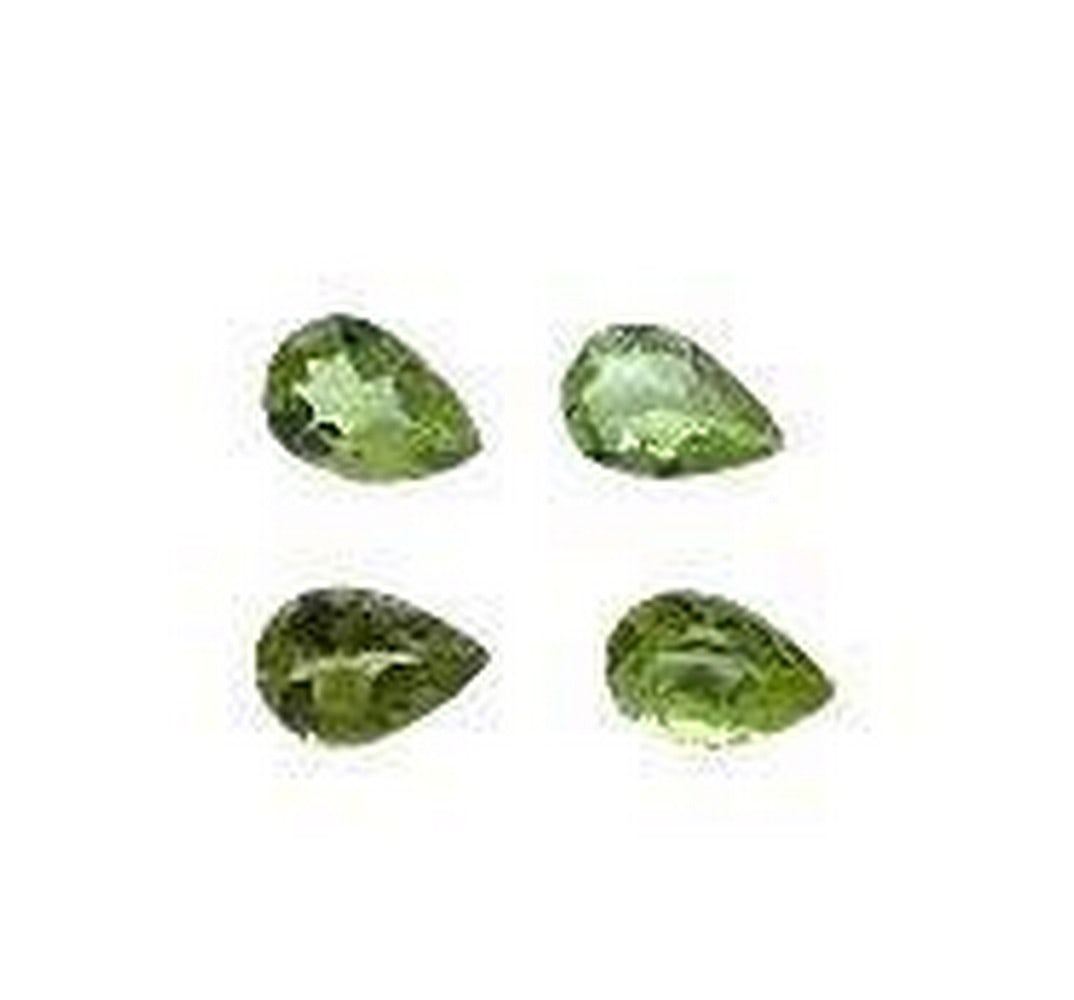 Lot of 4 Pear Green Peridot Gemstones 0.52ct Total Weight: Lot of 4 Pear Green Peridot Gemstones 0.52ct Total Weight Peridot is a stone believed to bring good health, restful sleep and peace to relationships by balancing emotions and mind. Color: Light Green