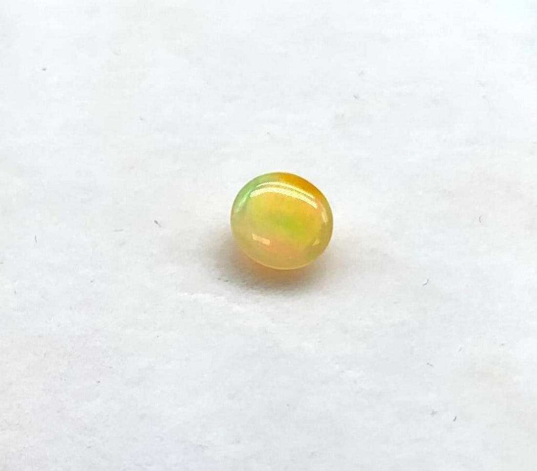 1.036 Round Cut Opal Gemstone (1 of 2)
