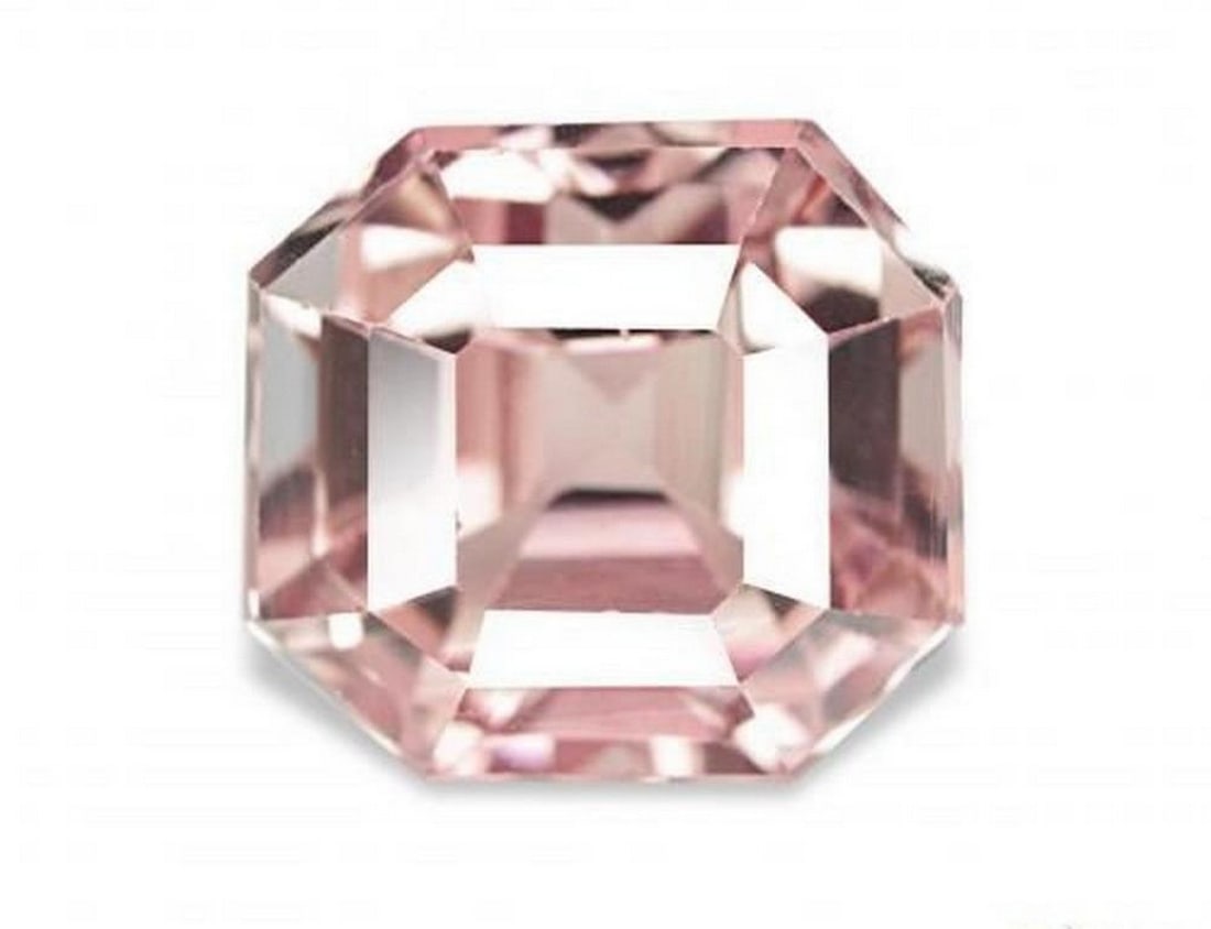 3.16 ct Octagon / Emerald Cut Natural Earthy Pink Tourmaline: 3.16 ct Octagon / Emerald Cut Natural Earthy Pink Tourmaline Introducing the Octagon / Emerald Cut Natural Earthy Pink Tourmaline, a refined gem showcasing soft, warm pink tones with excellent VS clar