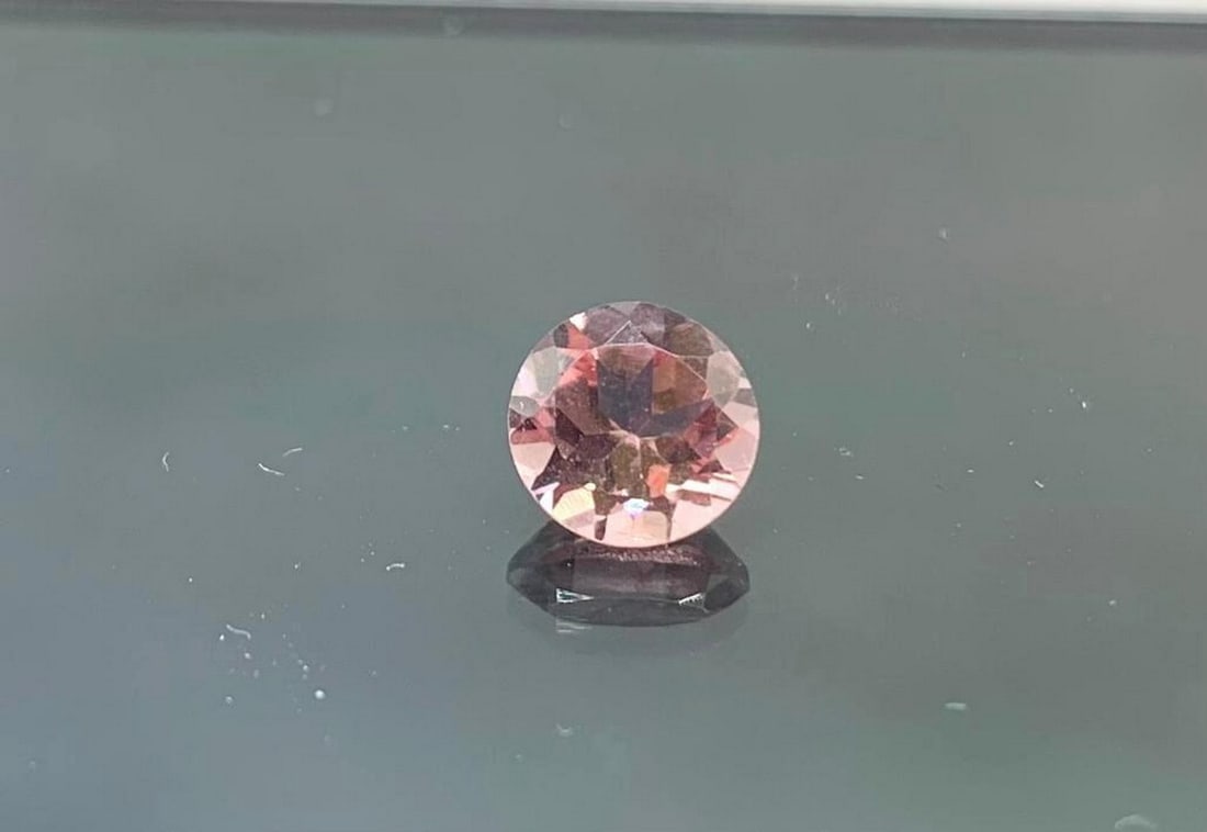 1.26ct Diamond Cut Fancy Pink Tourmaline Gemstone: 1.26ct Diamond Cut Fancy Pink Tourmaline Gemstone Its soft, rosy blush evokes feelings of romance and tenderness, making it an ideal gemstone for those seeking a unique and enchanting piece of