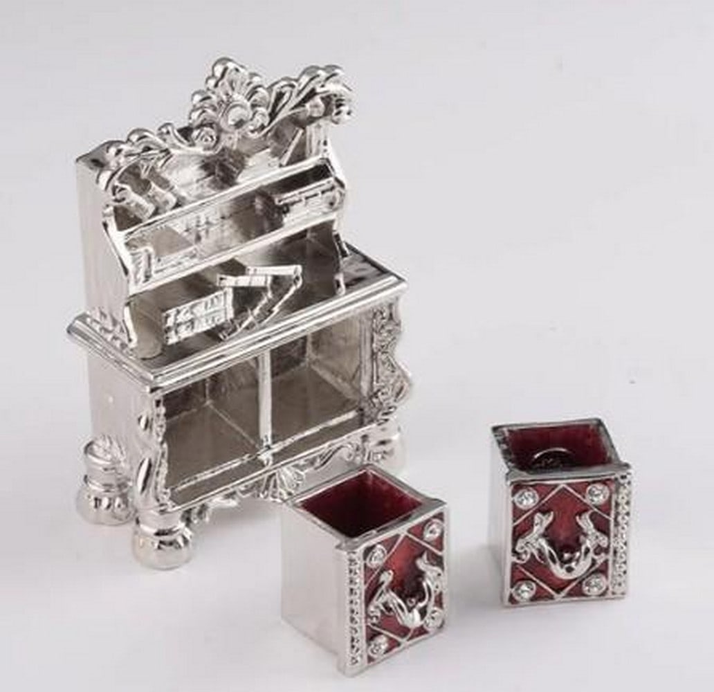 Timeless Library Trinket Box: Timeless Library Trinket Box This charming vintage bookshelf trinket box captures the warmth of a well-loved library in miniature form. Detailed with tiny sculpted books and classic design elements,