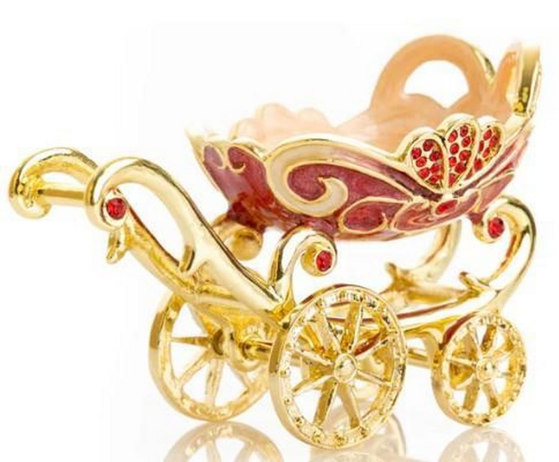 Classic Red Baby Pram Trinket: Classic Red Baby Pram Trinket Charming and nostalgic, this red vintage baby carriage trinket box captures the elegance of a bygone era. With ornate detailing and a classic stroller silhouette, it open