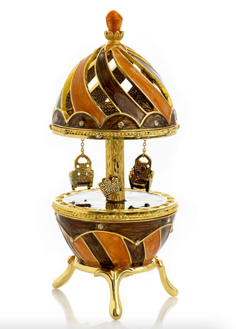 Royal Chair Brown Carousel Trinket Box: Royal Chair Brown Carousel Trinket Box Open the lid to reveal a spacious compartment, perfect for storing your most cherished treasures, from jewelry and keepsakes to small mementos. But what truly