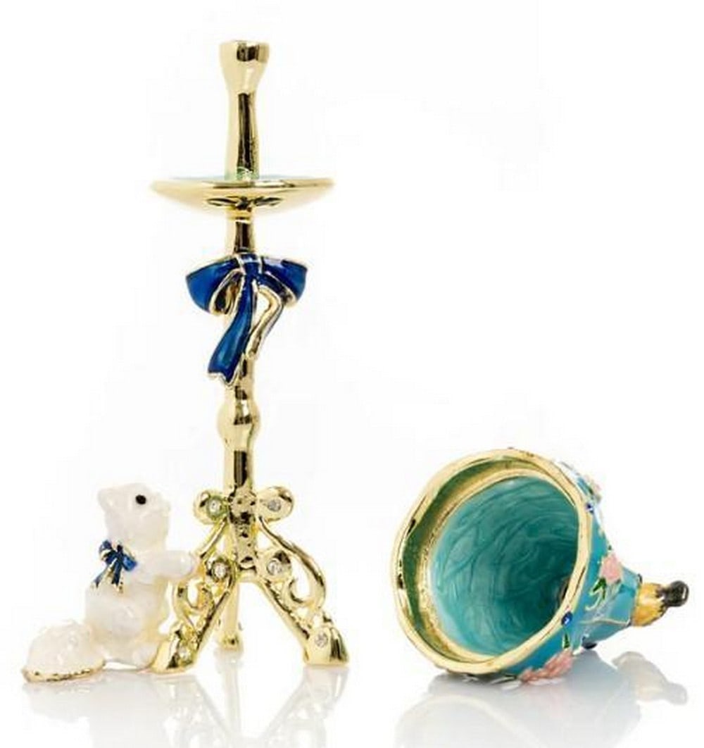 Curious Cat and Bird Lamp Trinket Box: Curious Cat and Bird Lamp Trinket Box Full of storybook charm, this trinket box features a tall, ornate gold standing lamp where a curious cat gazes up at a perched bird. The whimsical scene is brough