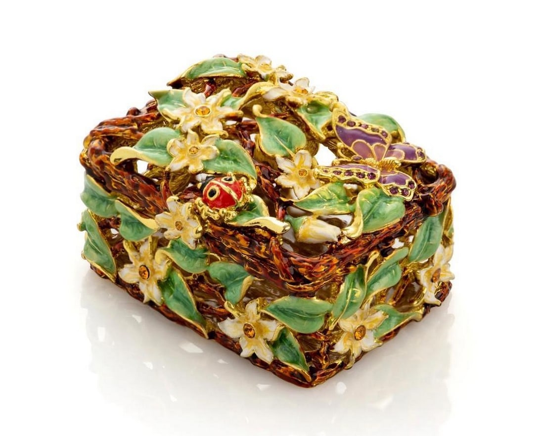 Enchanted Garden Treasures Trinket Box: Enchanted Garden Treasures Trinket Box The rich brown hue of this trinket box exudes warmth and elegance, making it a perfect addition to any room. The hand-painted details of the white flowers and ve