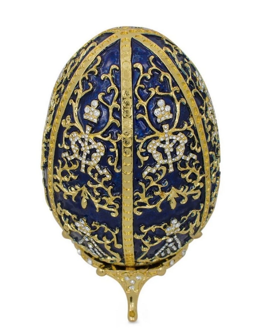 1895 Twelve Monograms Russian Egg: 1895 Twelve Monograms Russian Egg. Dimensions: 5' tall with stand; 4.5' tall without stand View Photos for Further Details.