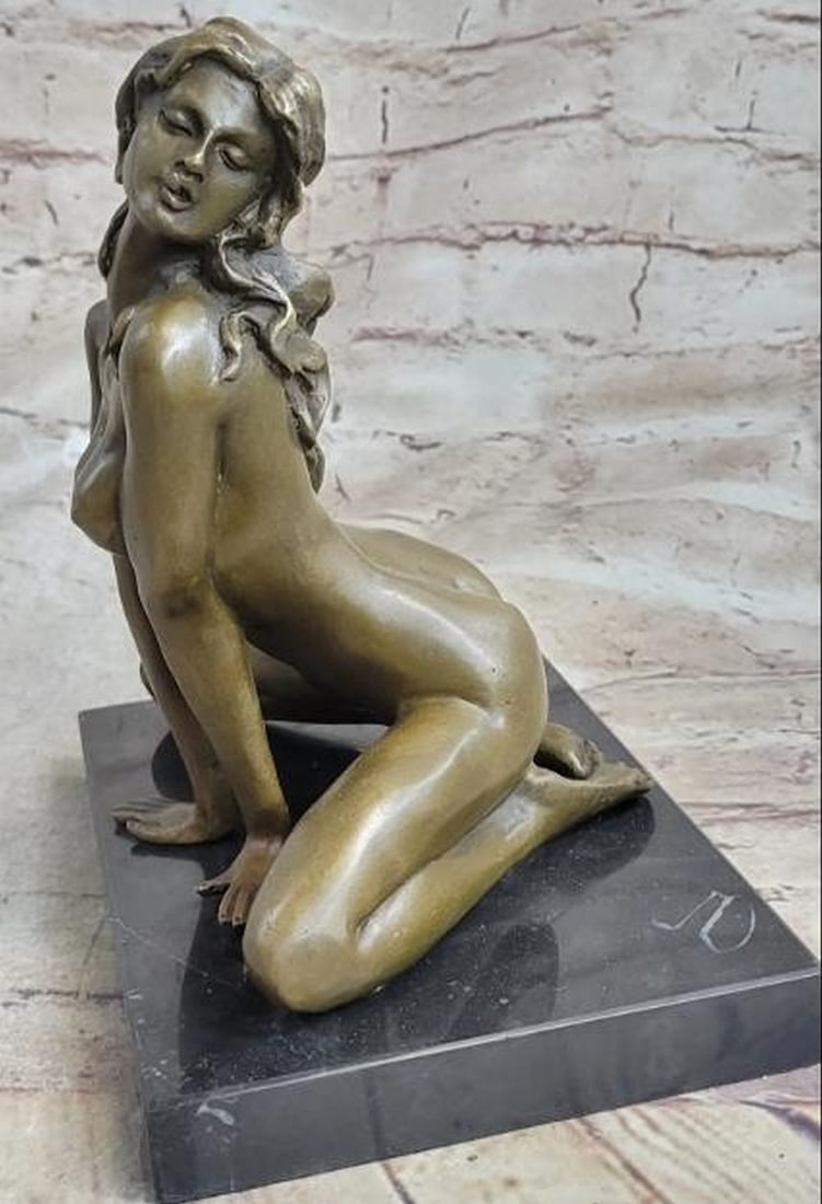 Kneeling Grace Nude Bronze Sculpture - 8" x 7": Kneeling Grace Nude Bronze Sculpture - 8" x 7" This is an original sculpture inspired and bearing the signature of renowned artist Odegaard. It depicts a nude woman on her knees, arching her b