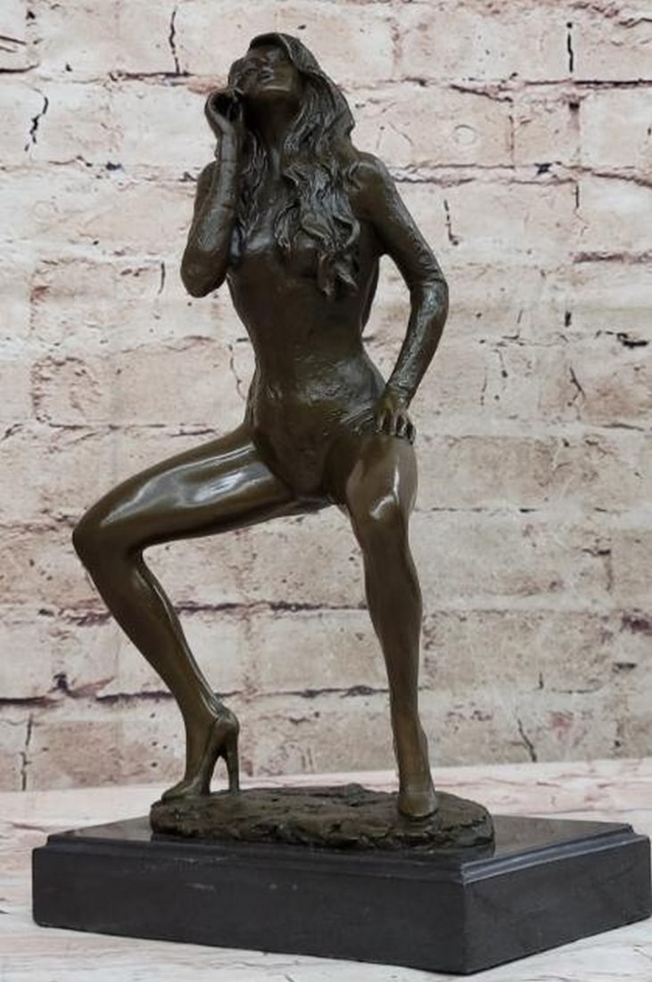 Bold Seduction Bronze Sculpture- 12" x 7": Bold Seduction Bronze Sculpture- 12" x 7" This is an original, inspired by and bearing the signature of artist Milo. Cast in bronze with striking detail, this sculpture portrays a confident yo