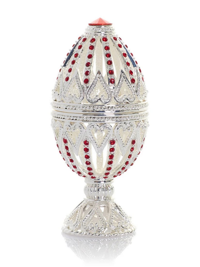 Silver Easter Heart Crystal Egg Trinket Box: Silver Easter Heart Crystal Egg Trinket Box This enamel trinket box, hand-painted and adorned with Austrian crystals, is finished with silver plating and features a secure magnetic closure. Each