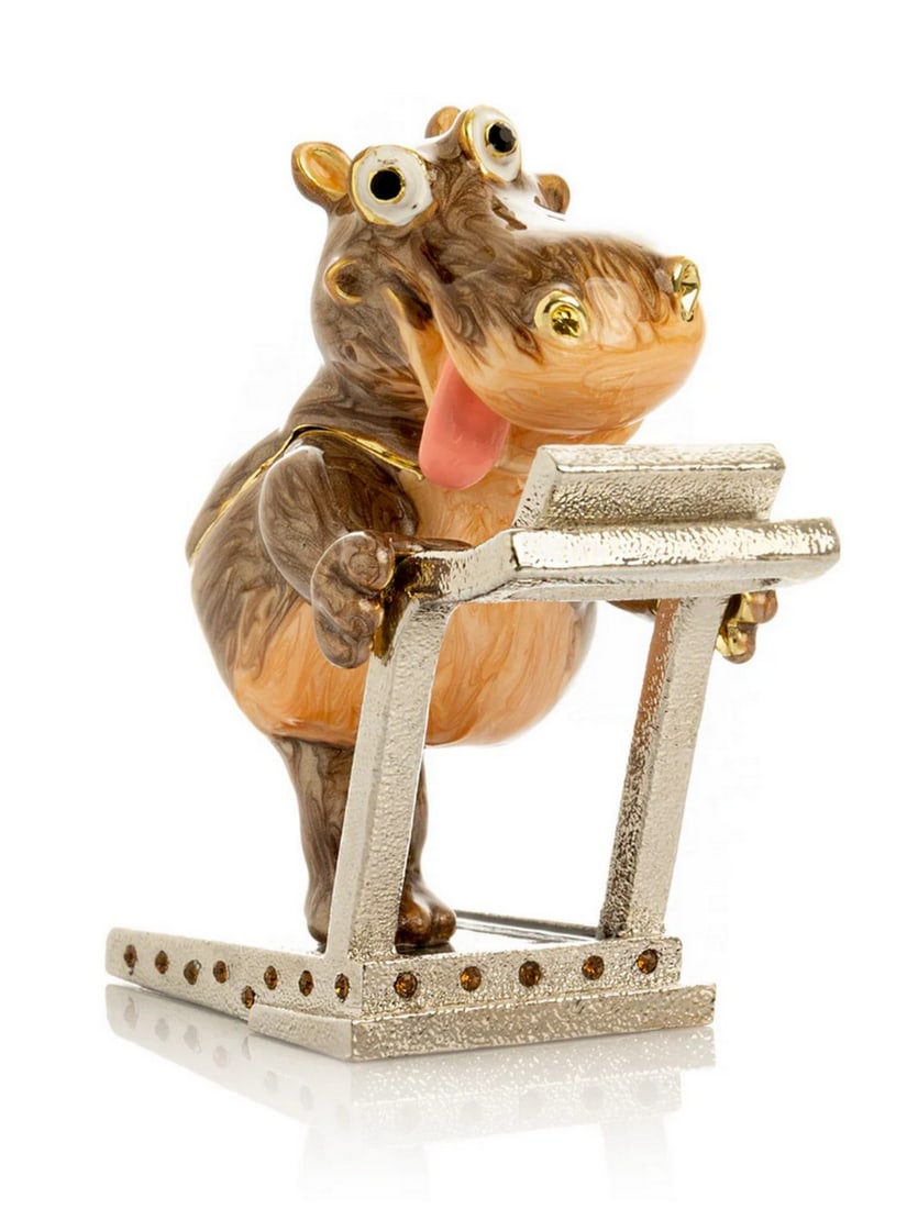 Marathon Hippo Treadmill Trinket Box: Marathon Hippo Treadmill Trinket Box This enamel trinket box, hand-painted and adorned with Austrian crystals, is finished with 24K gold plating and features a secure magnetic closure. Each crystal