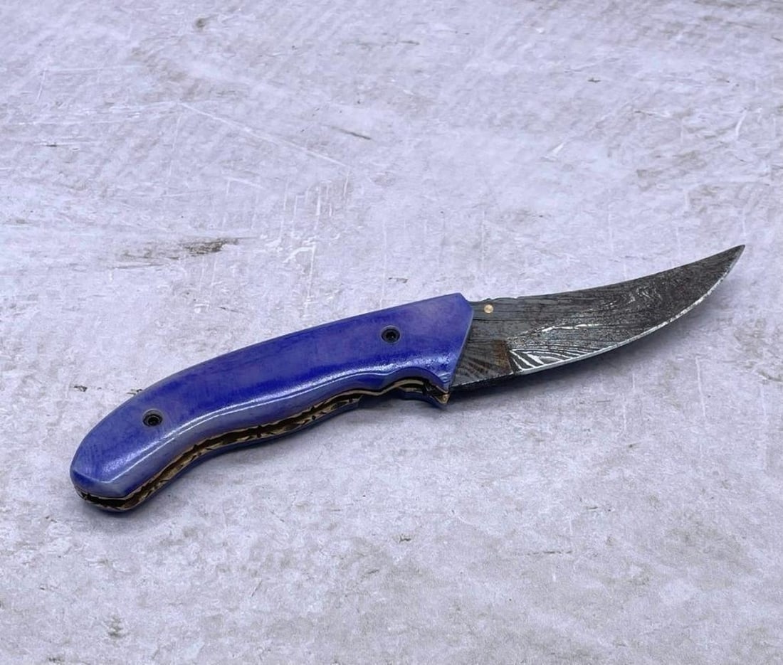 Oceans Depths Folding Damascus Knife: Oceans Depths Folding Damascus Pocket Knife. High Quality steel is utilized to forge the finest product in the world. Unique Custom Hand-Forged Damascus Steel Bowie Blade Construction. Blade Construct