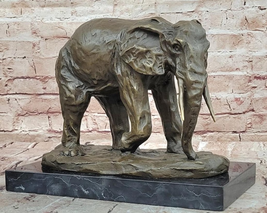 Miguel Lopez (Milo) Original Bronze Sculpture of Elephant - 9.5'' x 11'': Miguel Lopez (Milo) Original Bronze Sculpture of Elephant - 9.5" x 11" This bronze sculpture depicts an elephant in motion, rendered with attention to texture, proportion, and anatomical