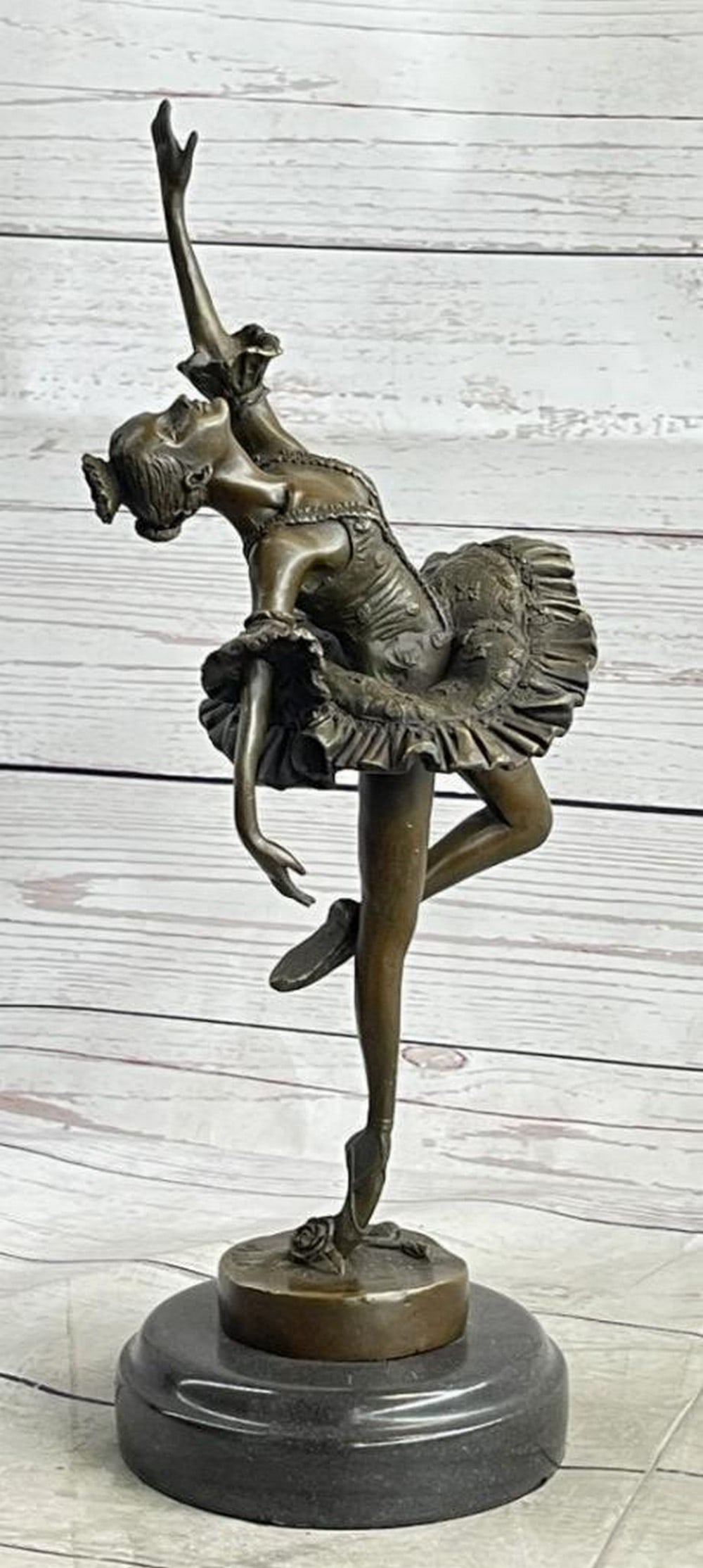 Milo Signed Ballerina Bronze Sculpture On Marble Base - 13'' x 8'': Ballerina Bronze Sculpture - 13" x 8" Experience the captivating performance of a prima ballerina as she gracefully takes center stage. With impeccable training and a deep love for her art, she 