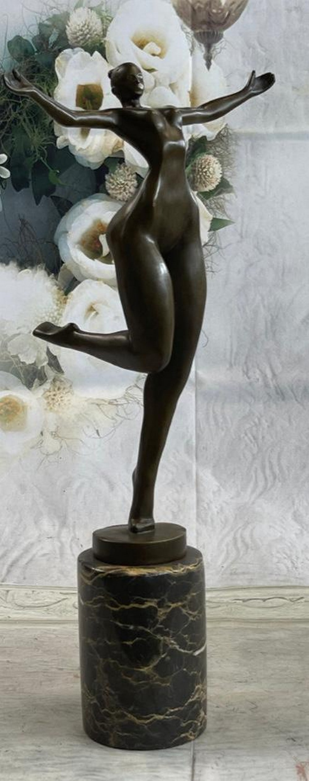 Abstract Cubism Woman Bronze Sculpture: Abstract Cubism Woman Bronze Sculpture An abstract beauty poses for a portrait. She stretches her long round body. She kneels and curls an arm upward. Like a classic pin-up, she pushes her chest out, 
