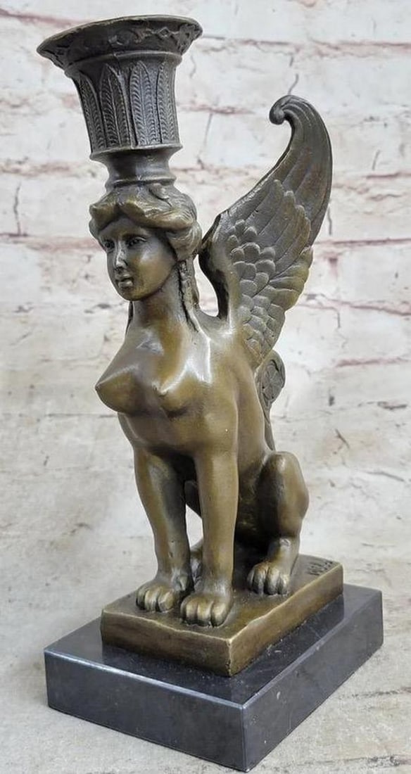 Art Deco Female Sphinx Bronze Statue - 9'' x 4'': Art Deco Female Sphinx Bronze Statue - 9" x 4" This elegant candle holder showcases the Sphinx, a mythical Greek creature famed for riddles and a lethal embrace. The bronze sculpture captures in