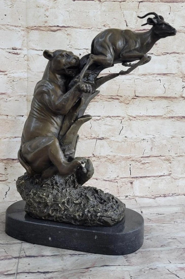 Survival Of The Jaguar & Gazelle Bronze Sculpture - 13'' x 12'': Jaguar & Gazelle Bronze Sculpture - 13" x 12" This jaguar was lurking in the shadows of his play field and spotted his meal of the day. The baby deer starts to run for his life, but knows their