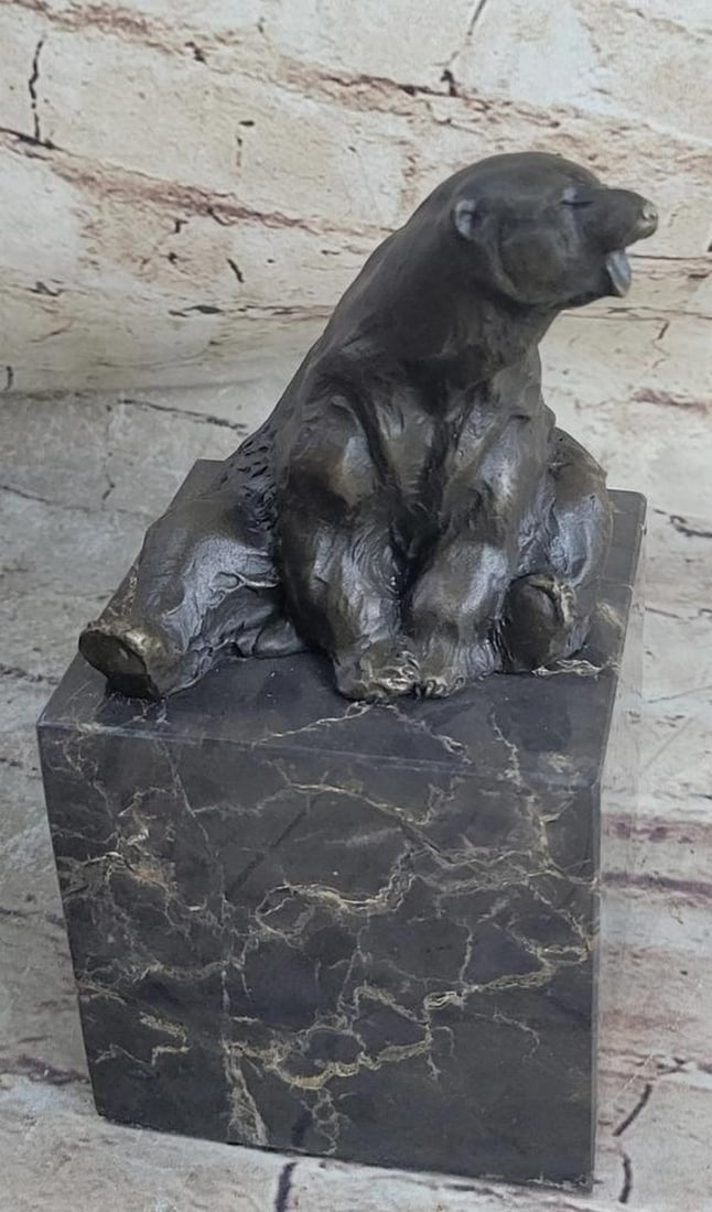Resting Polar Bear Bronze Sculpture On Marble Base - 8'' x 4'': Polar Bear Bronze Sculpture - 8" x 4" This amazing animal figurine is an great and very lifelike bronze of a wild and powerful polar bear, sitting on a brown marble base. The figure is made of