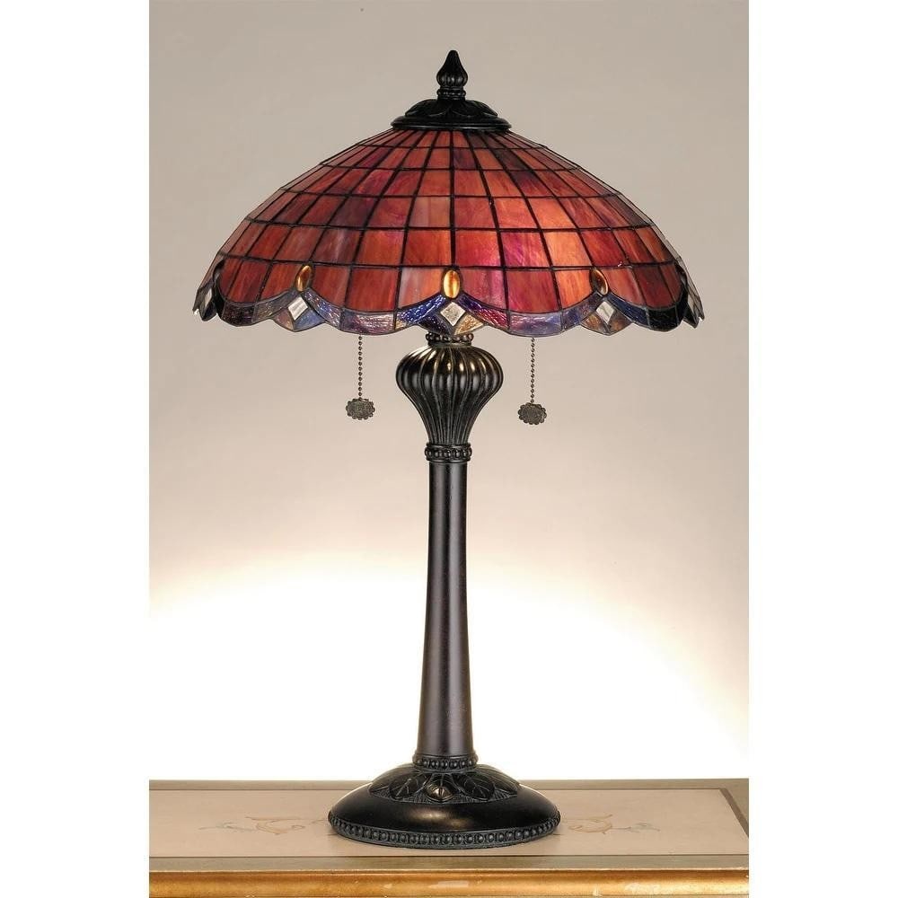 Garnet Glow Tiffany Table Lamp: Garnet Glow Tiffany Table Lamp This 24-inch Tiffany table lamp features richly colored stained glass shades in deep garnet tones, trimmed with scalloped amethyst accents and sparkling amber jewels. Cl