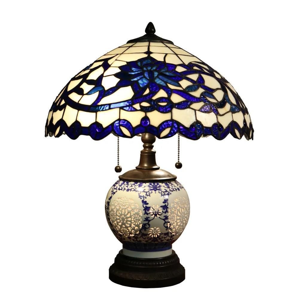 3-Light Blue Glass Tiffany-Style Table Lamp - 13'' H: 3-Light Blue Glass Tiffany-Style Table Lamp - 13" H Add vintage charm to any room with this Tiffany-style table lamp. Featuring a three-light design with a blue stained glass shade and bronze finis