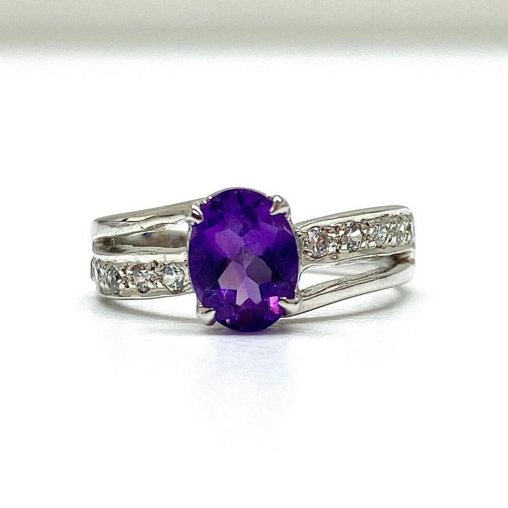 925 Sterling Silver Ring with Austrian Crystal Double Band with Amethyst Gemstone in a Halo Setting: 925 Sterling Silver Ring with Austrian Crystal Double Band with Amethyst Gemstone in a Halo Setting. Amethyst crystals represent purification and connection to spiritual and divine beings. The meaning