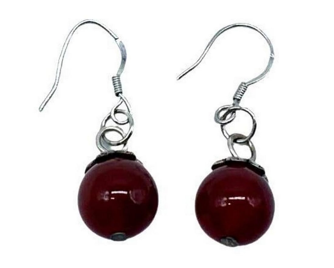 Red Agate Gemstone Tibetan Silver Teardrop Earrings: Red Agate Gemstone Tibetan Silver Teardrop Earrings The focal point of these earrings is the mesmerizing Red Agate gemstone, known for its striking red hue with captivating natural patterns. These Red