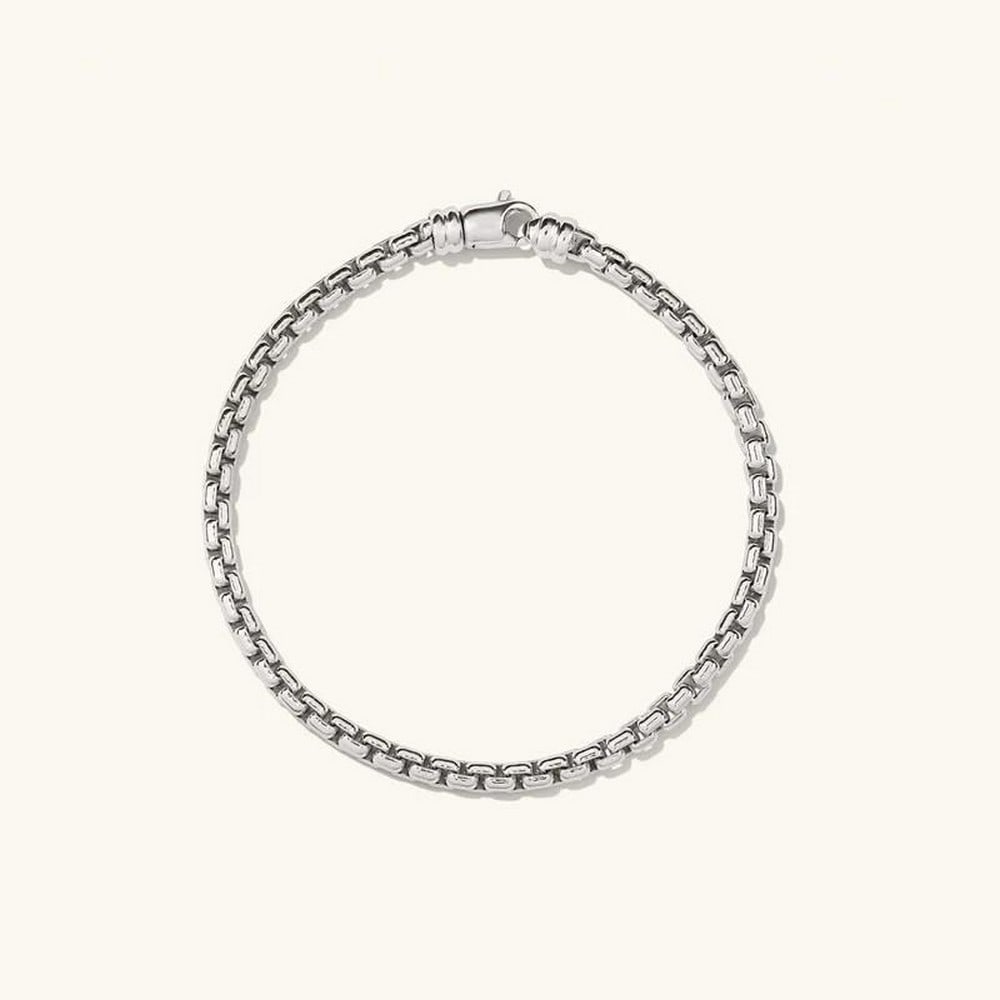 Sterling Silver Box Chain Bracelet: Sterling silver box chain bracelet made from Sterling Silver. Sleek and versatile, this bracelet features a timeless design crafted from sterling silver. Perfect for layering or wearing solo, it adds