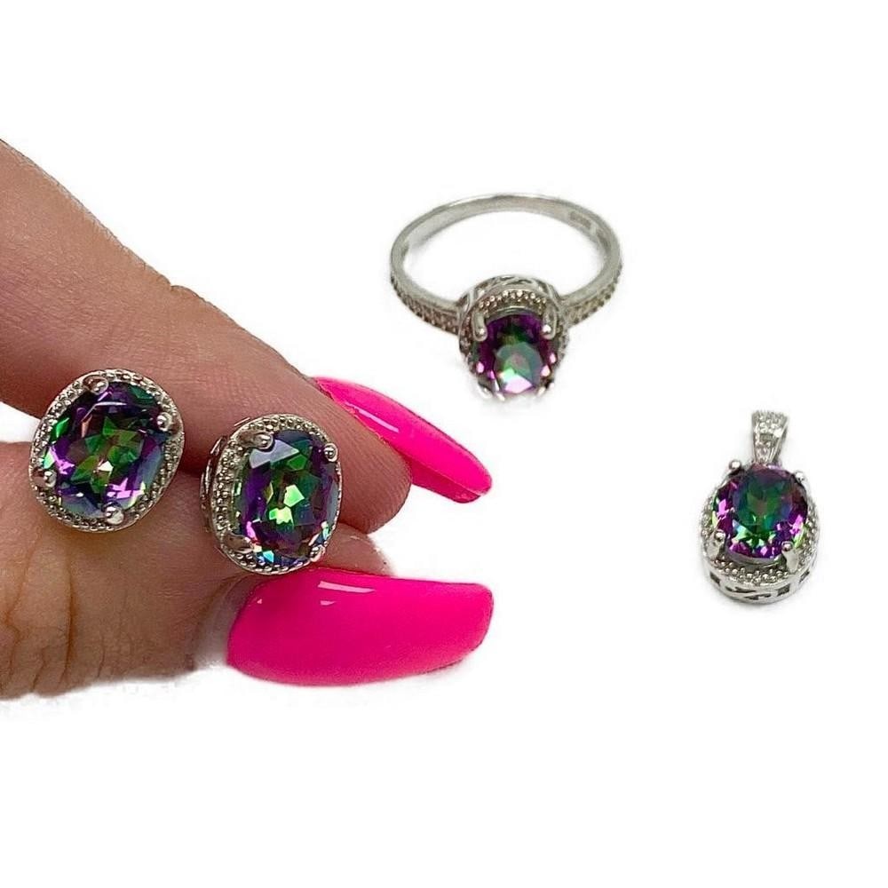 Prismatic Ladies 3.89 Carat Topaz Stones with 925 Sterling Silver: Prismatic Ladies 3.89 Carat Topaz Stones with 925 Sterling Silver Each jewelry piece is set with a beautifully cut oval topaz stone. Every gem s fire withholds hints of purple, green, and small