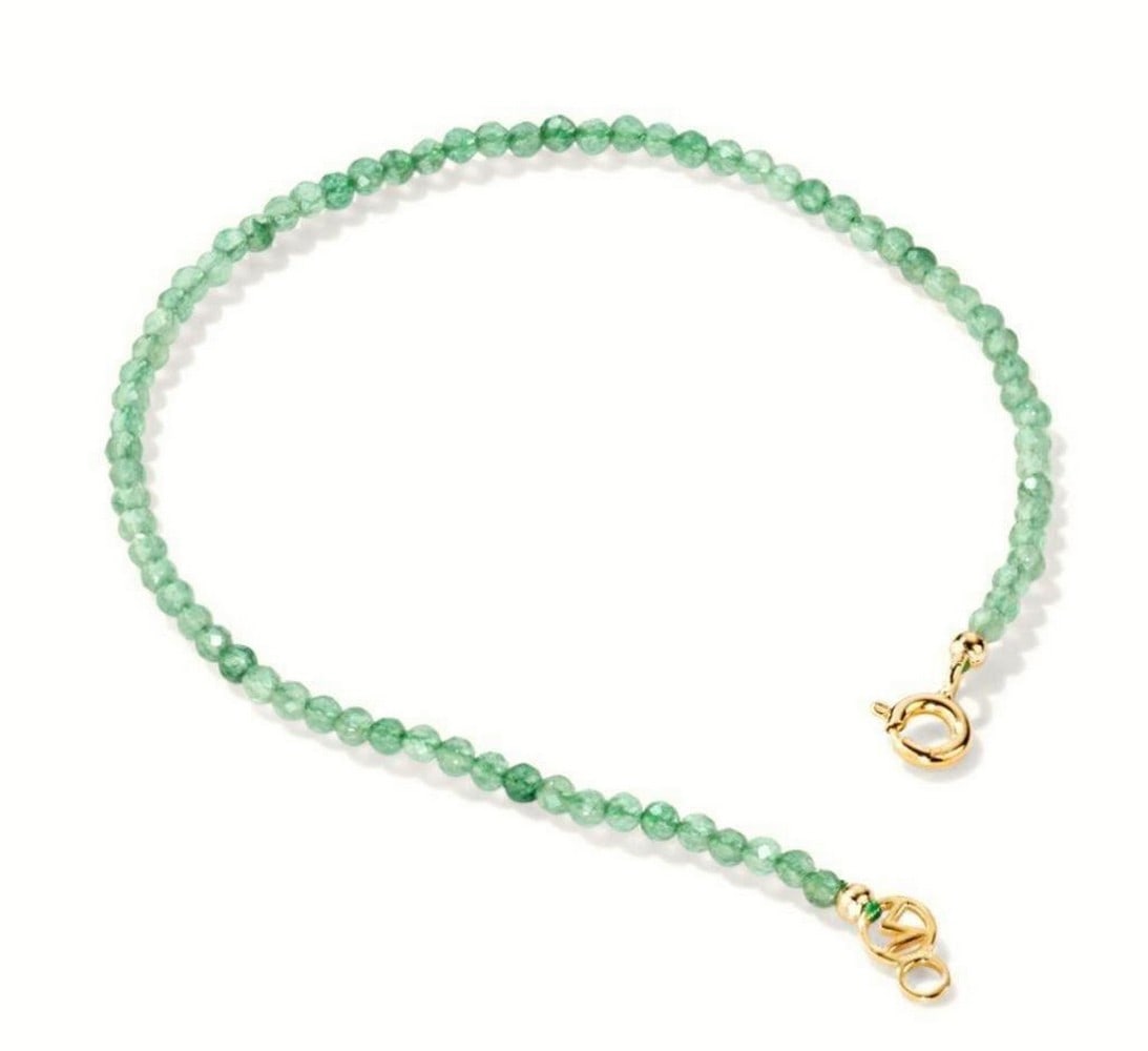 Green Gemstone 6.5'' Beaded Bracelet: Green Gemstone 6.5" Beaded Bracelet This gorgeous green gemstone bracelet is light enough that it gives a barely there feel but has the colours to make sure it doesn t go unnoticed by others!