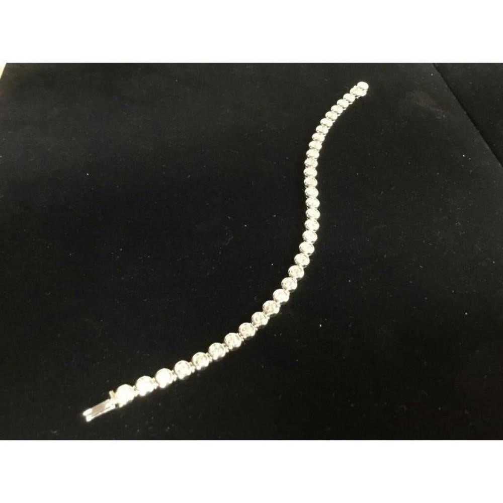 Exquisite 18K White Gold Woman's Bracelet With 3.4ct Inset Diamonds: An Exquisite 18K Solid White Gold Woman's Bracelet With 3.4ct of Inset Diamonds (VS,F2G,Good). A flag ship of Italian Craftsmanship for ladies fashion and apparel. This Bracelet is favorite in custom 