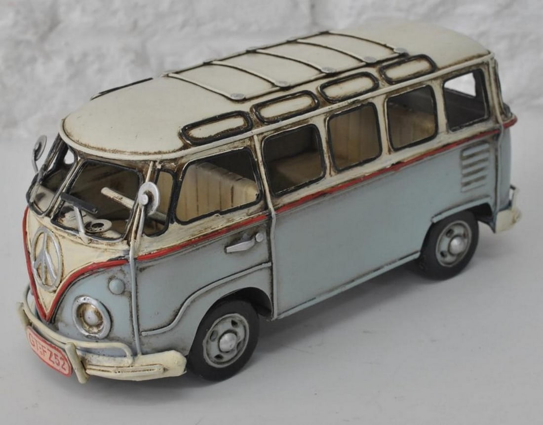 Die Cast1957 Light Blue Kombi Volkswagen Van: Die Cast1957 Light Blue Kombi Volkswagen Van Add sporty style to any space with our Rustic Two-Tone Classic VW Volkswagen Bus Sculpture. Featuring a detailed rustic iron frame and a blue-and-white ext