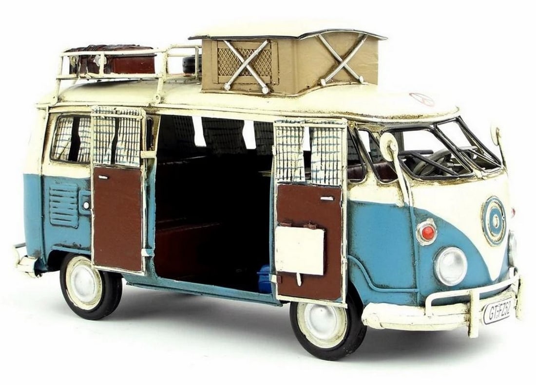 VW Volkswagen Samba Microbus Handcrafted Tinplate Model: VW Volkswagen Samba Microbus Handcrafted Tinplate Model Add a vintage touch to your table, desk, or shelf with this Volkswagen Mini Bus model. Crafted with a rustic iron frame, it features a white and