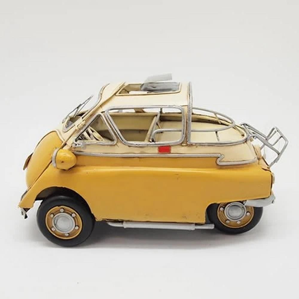 BMW Isetta 250 Collector Model: BMW Isetta 250 Collector Model Add a playful vintage touch to your table, desk, or shelf with this BMW Isetta 250 tinplate model. Crafted with a rustic iron frame, it features a yellow and white metal