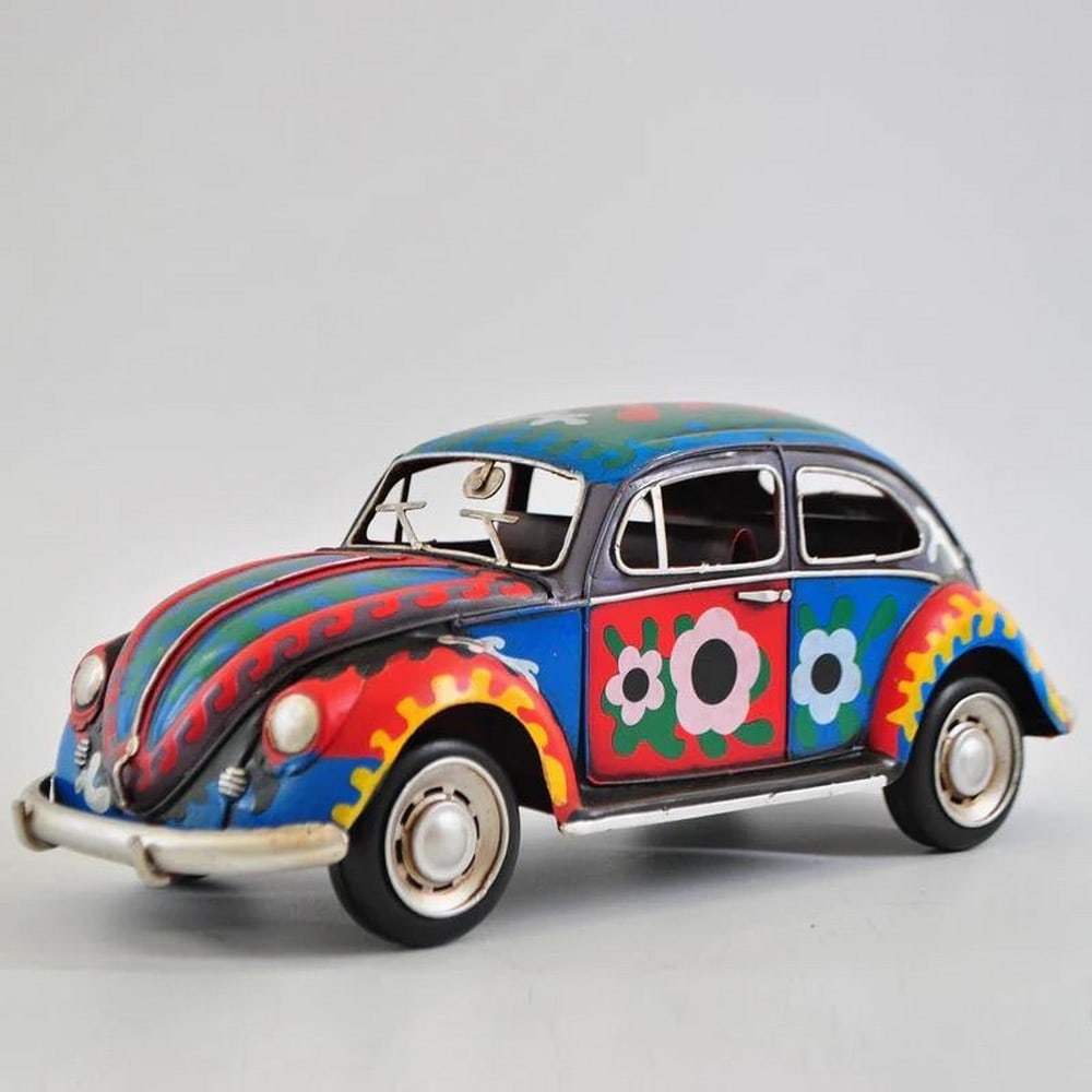 1934 Colorful VW Beetle With Flower Decoration Die Cast Car Figurine: 1934 Colorful VW Beetle With Flower Decoration Die Cast Car Figurine Beautifully handmade and each piece is a unique collectible and show piece for your home. Key Features: Decoration & parts comes wi
