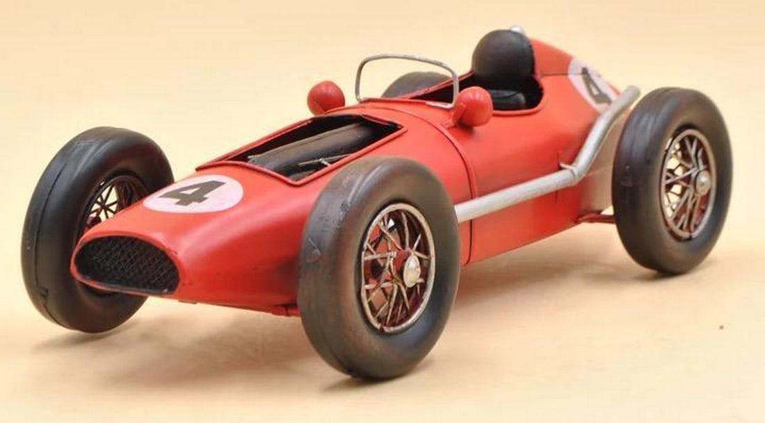 Jayland USA 1: 12 Scale Diecast Model: 1958 Formula 1 Metal Sculpture: Jayland USA 1: 12 Scale Diecast Model: 1958 Formula 1 Metal Sculpture Add a sporty flair to your table, desk, or shelf with our Rustic 1958 Ferrari 246 F1 Model. Crafted with a rustic iron frame, this