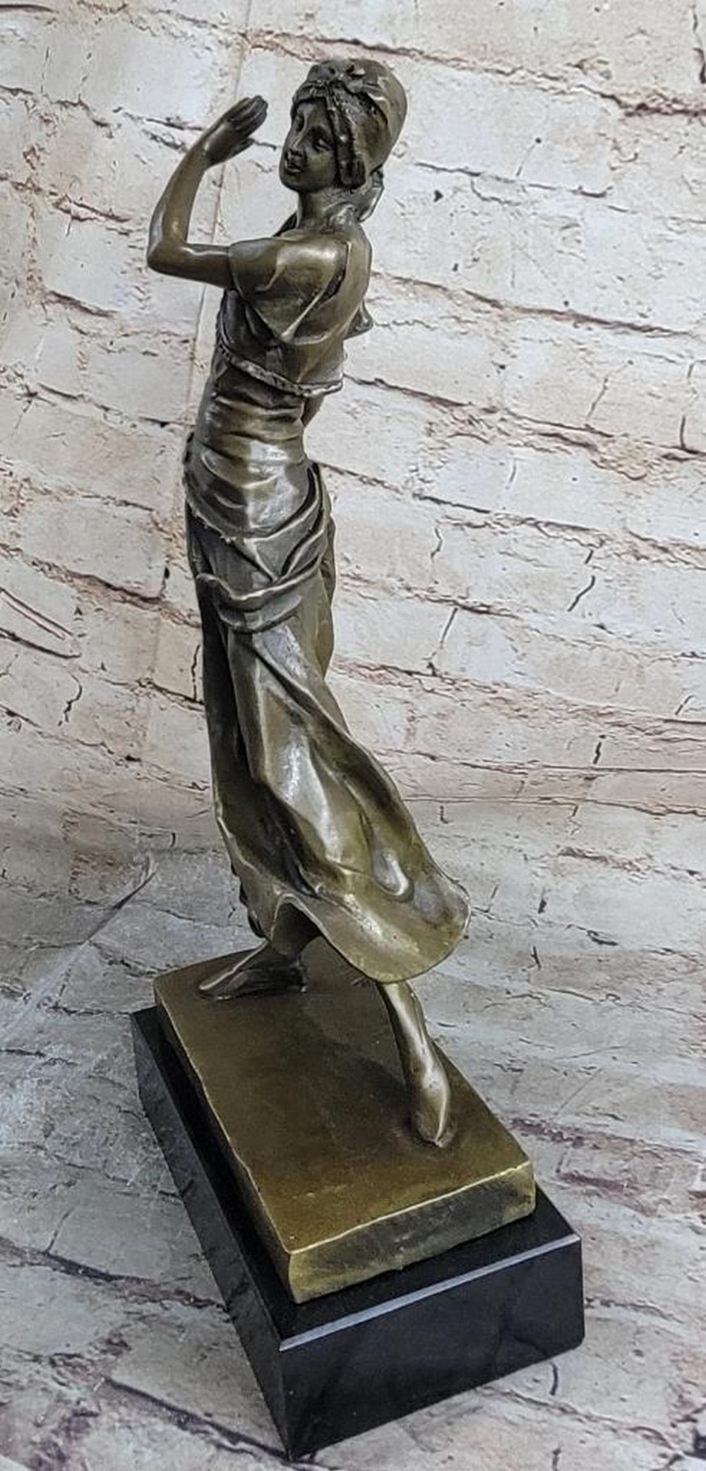 Bronze ''Gory Gypsy Dancer'' Sculpture on Marble Base - 15lbs: This beautiful sculpture of a Indian lady dancing is amazing in details from her dress to her face. She wears this long one piece short sleeve dress, with a beautiful gold vest and belt that comes wit