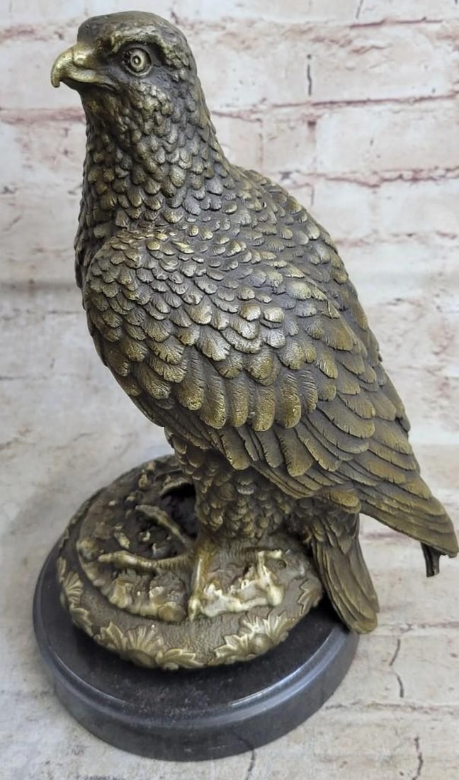 Guardian Eagle Bronze Sculpture: Guardian Eagle Bronze Sculpture This eagle lets time pass by as he rests atop a nest, he watches carefully as his prey comes at close range. He sits peacefully and patiently as his claws are spread ou