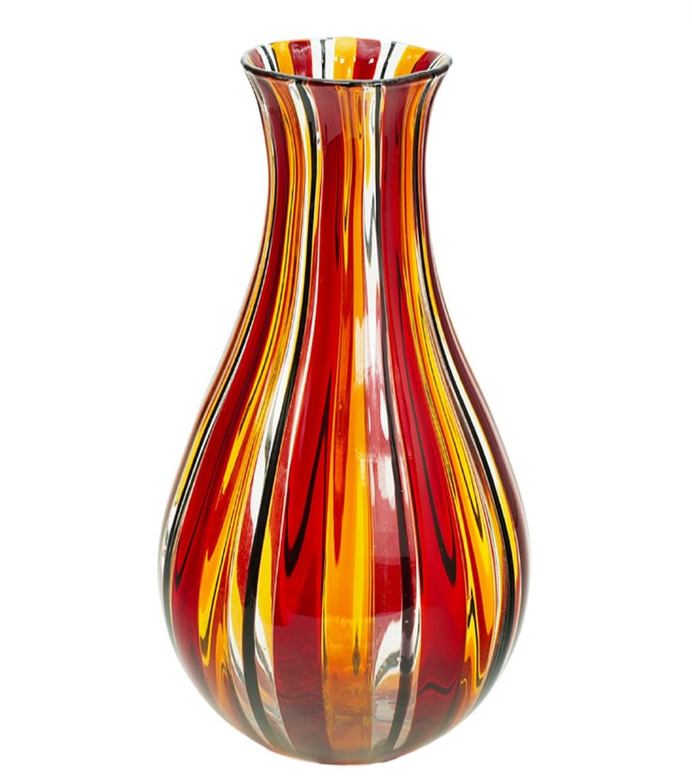 Murano Filigree Glass Vase: Murano Filigree Glass Vase This Murano glass vase features a filigree texture created with the use of glass canes, handcrafted by skilled artisans in Venice using traditional glassmaking techniques.