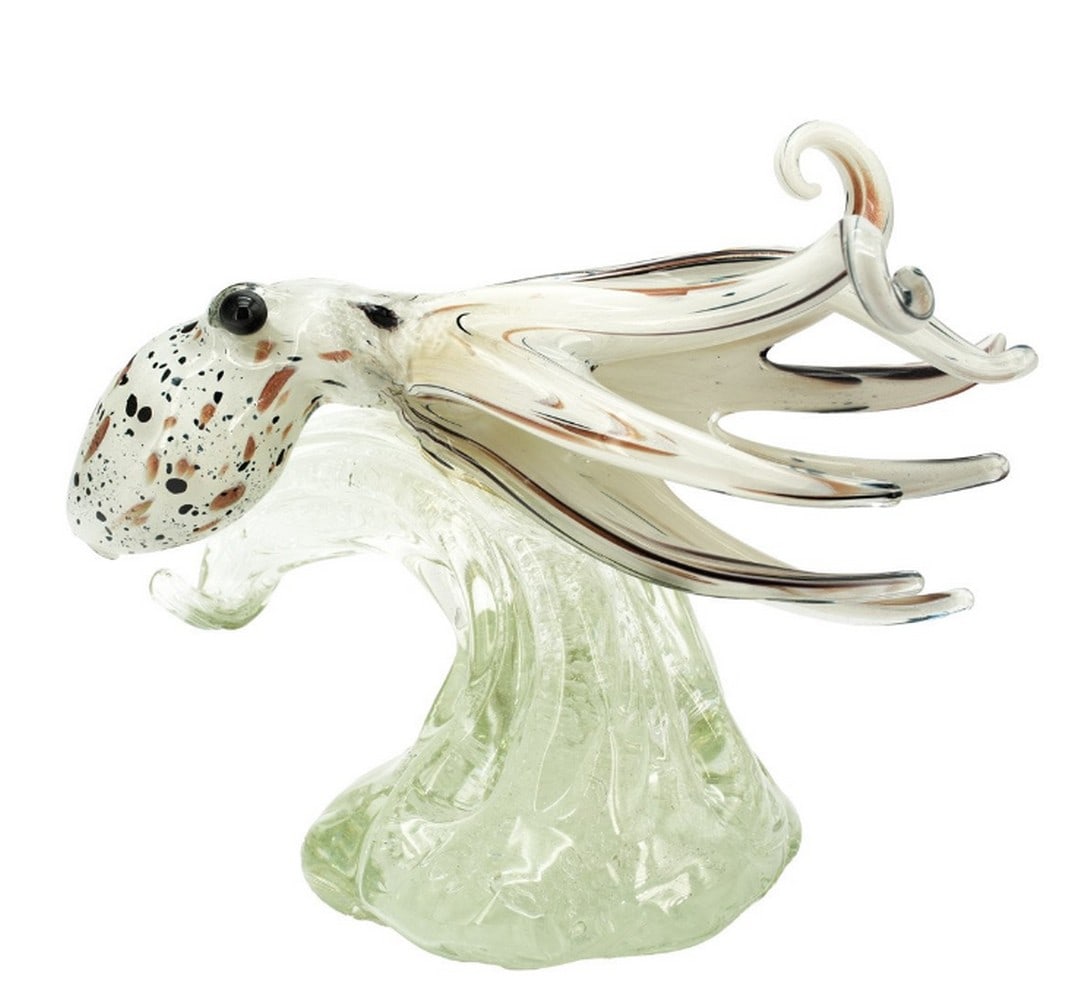 White Octopus on Glass Wave: White Octopus on Glass Wave This exquisite Murano glass sculpture features a detailed white octopus resting on a clear glass base designed to evoke ocean waves. Each elegantly curved tentacle highligh