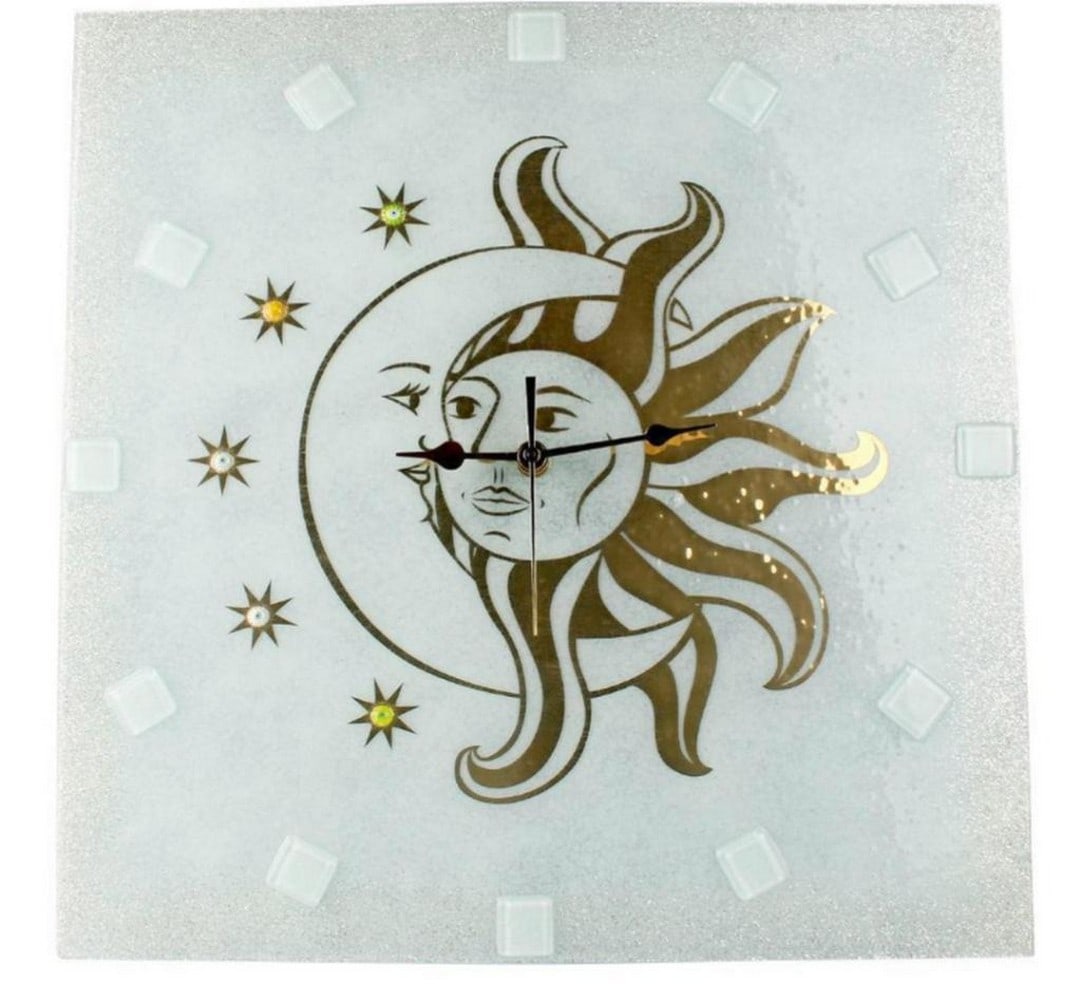 Sun and Moon Wall Clock - White Murano Glass with Real Gold Leaf: Sun and Moon Wall Clock - White Murano Glass with Real Gold Leaf This iconic Sun and Moon wall clock is crafted using the glass fusing technique with Murano murrine millefiori. A functional yet