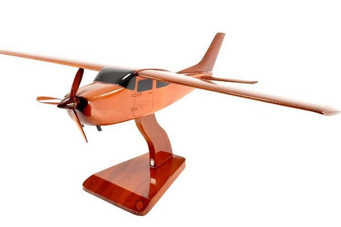 Cessna T-210 Centurion Wooden Model: Cessna T-210 Centurion Wooden Model Experience the legacy of aviation with our finely crafted Cessna T-210 Centurion Wooden Model. Carved from solid mahogany, this exquisite replica captures the