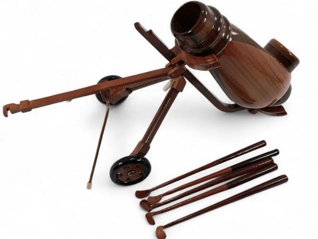 Classic Drive: Mahogany Golf Bag With Clubs: Classic Drive: Mahogany Golf Bag With Clubs. A stunning wooden model that captures the essence of golf's elegance and tradition. Crafted from rich mahogany, this intricately detailed replica