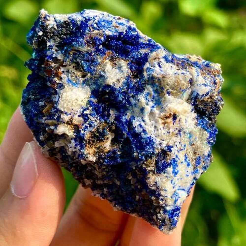 81g Natural Azurite Crystal Specimen: 81g Natural Azurite Crystal Specimen A stunning 81g natural azurite crystal specimen, known for its deep blue hues and unique formations. Perfect for collectors and mineral enthusiasts. Weight: 81g Vi