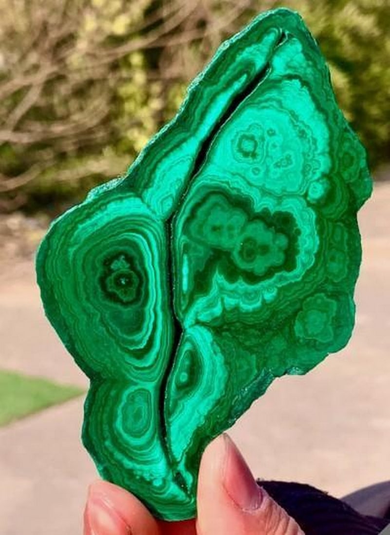 Glossy Green Malachite with Rare Transparent Cluster Crystals: Glossy Green Malachite with Rare Transparent Cluster Crystals This 116 gram natural malachite specimen features rich green banding and a smooth, glossy surface accented by striking transparent crystal