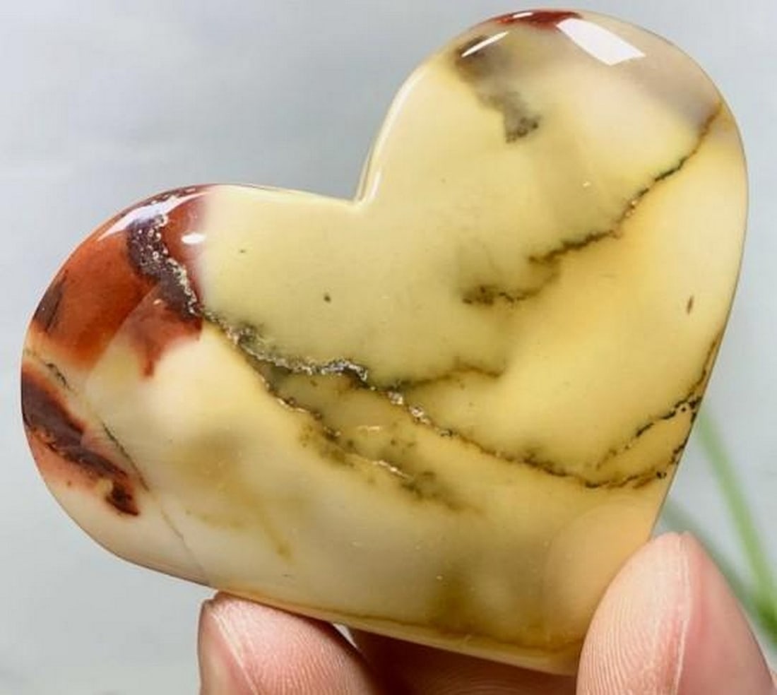 Natural Opal Quartz Heart Restored Mineral Specimen: Natural Opal Quartz Heart Restored Mineral Specimen Weighing 56 grams this heart-shaped specimen features natural opal quartz with delicate translucence and subtle flashes of opalescence. Carefully re