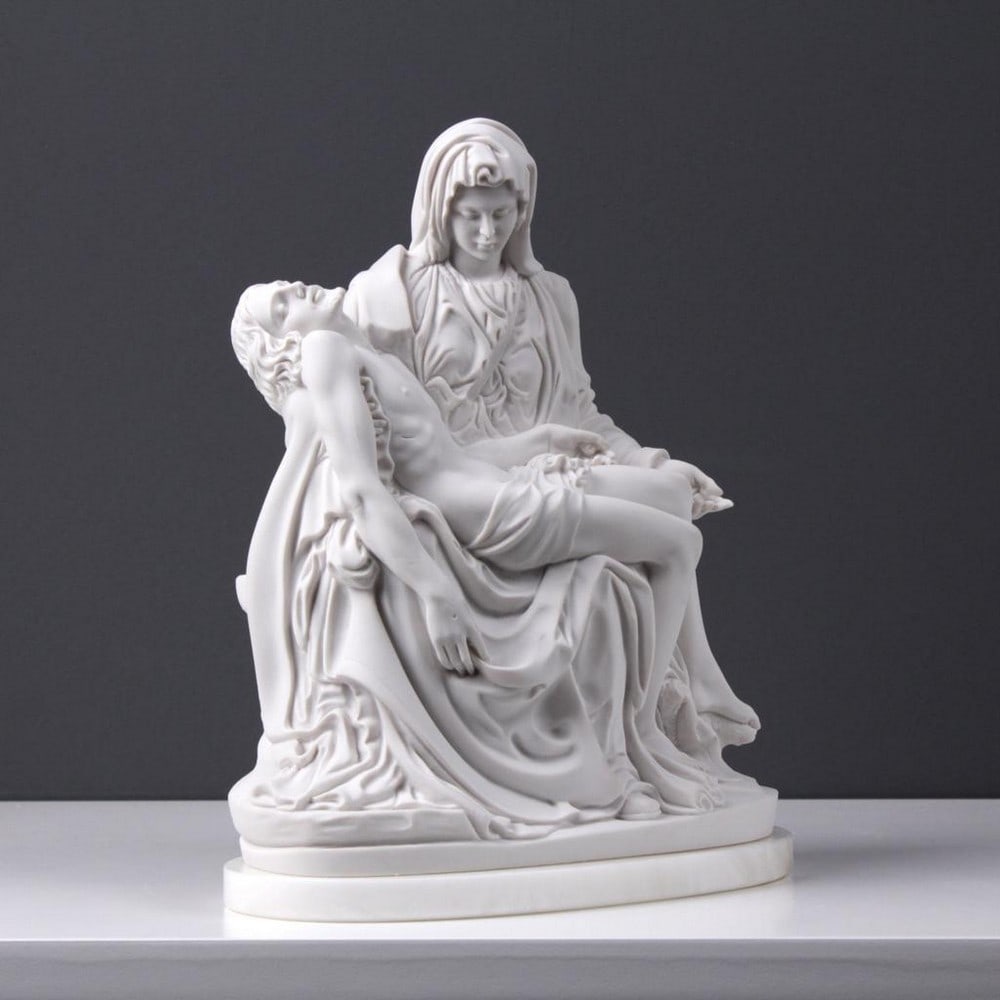 Sculpture After Michelangelo ''Pieta'' - (4.6lbs): Sculpture After Michelangelo " Pieta" - (4.6lbs) Our sculpture is a meticulous reproduction of the renowned Pieta Statue created by Michelangelo. It captures the essence of the original masterpi