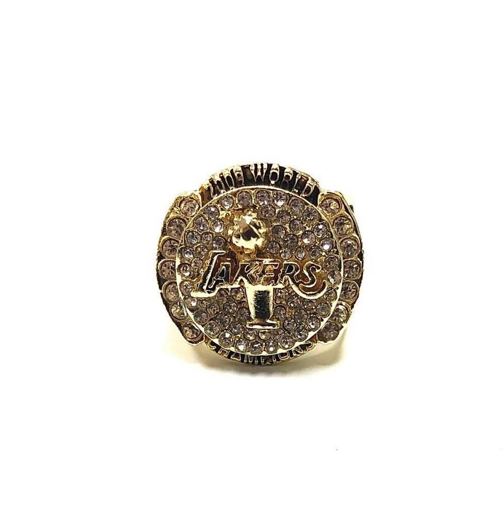 2009 LA Lakers Kobe Bryant NBA Championship Ring: 2009 LA Lakers Kobe Bryant NBA Championship Ring. A Perfect Replica Crafted With Gold Gilt And Semi Precious Stones. The late Kobe Bryant was true pillar of the basketball being considered one of the 